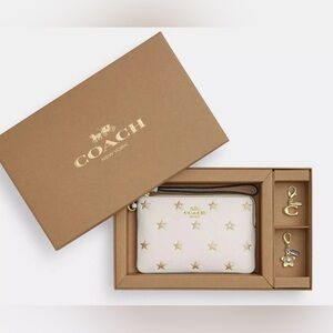 NWT Coach Cream and Gold Star Wristlet